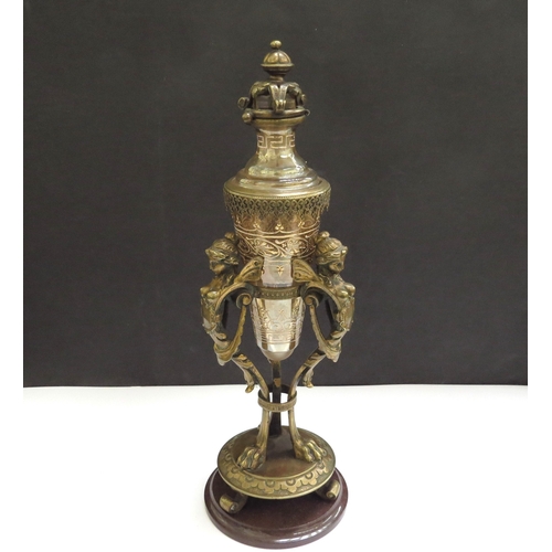 6337 - A cone shaped etched glass perfume bottle in an ormolu support decorated with female caryatids, 23cm... 