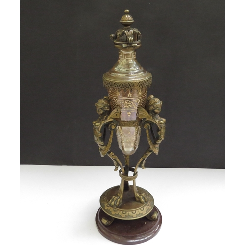 6337 - A cone shaped etched glass perfume bottle in an ormolu support decorated with female caryatids, 23cm... 