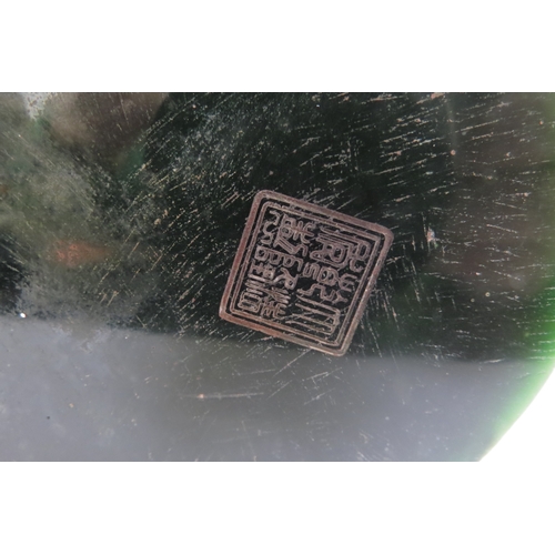 6339 - A Chinese jade brush pot decorated with a Ho-Ho bird and mythical dragon, impressed seal mark to bas... 