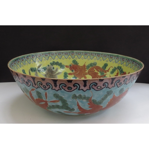 6348 - A 19th Century Chinese bowl decorated with goldfish in vibrant colours, 25cm diameter (chipped)