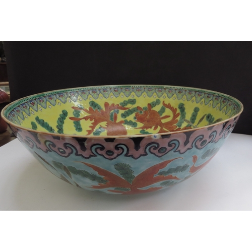 6348 - A 19th Century Chinese bowl decorated with goldfish in vibrant colours, 25cm diameter (chipped)