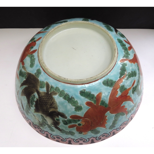 6348 - A 19th Century Chinese bowl decorated with goldfish in vibrant colours, 25cm diameter (chipped)