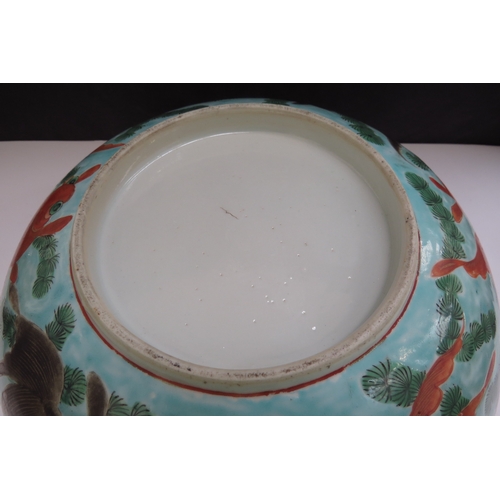 6348 - A 19th Century Chinese bowl decorated with goldfish in vibrant colours, 25cm diameter (chipped)