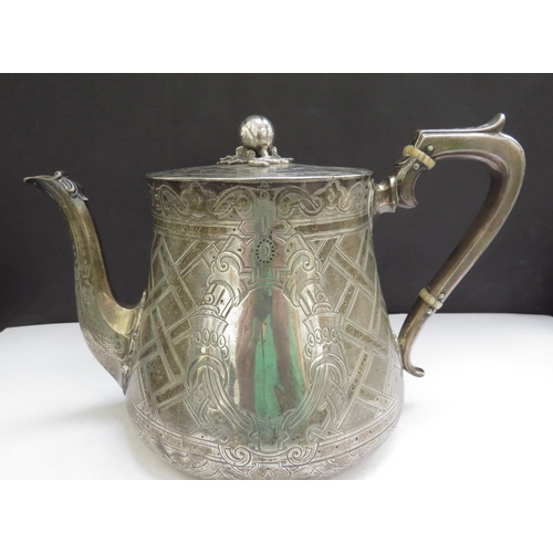 6461 - A John, Edward, Walter and John Barnard silver teapot with engraved decoration, monogram cartouche, ... 