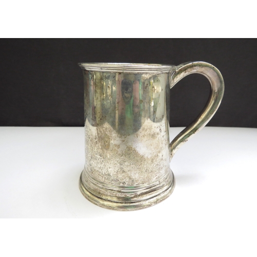 6484 - A Silver Thomas Bradbury & Sons Ltd miniature tankard with engraved details to front D S H from I A ... 