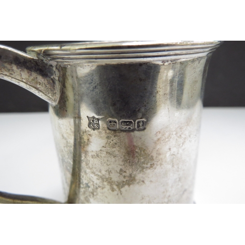 6484 - A Silver Thomas Bradbury & Sons Ltd miniature tankard with engraved details to front D S H from I A ... 