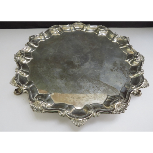 6486 - A Georgian silver salver, piecrust edge with shell relief, London 1764, 22.5cm diameter, 463g