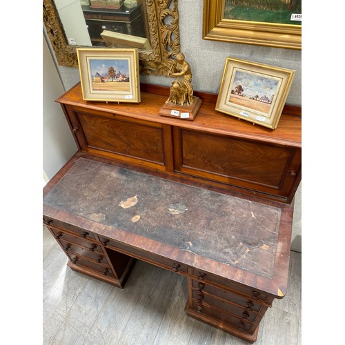 6036 - A Victorian mahogany twin pedestal estate desk with sliding cupboard pigeon hole top, veneer missing... 