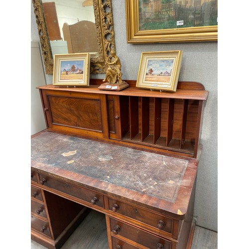 6036 - A Victorian mahogany twin pedestal estate desk with sliding cupboard pigeon hole top, veneer missing... 