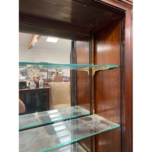 6070 - A Victorian apothecary display cabinet with mirrored back, adjustable shelves interior, two doors, 1... 