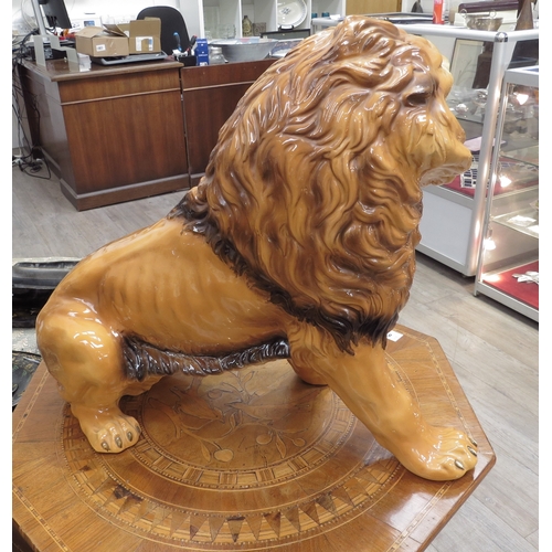 6136 - A Favaro Cecchello, Italy, figure of a lion roaring, 44cm tall, 57cm long