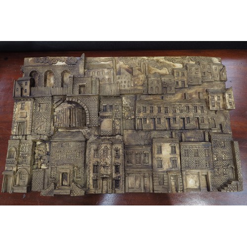 6301 - A Bernard Pearson plaque of rows of houses, dated 1983, 30.5cm x 48cm  (R)  £70