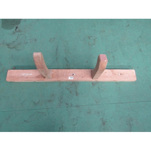 2305 - A Victorian pine tack/saddle hanger