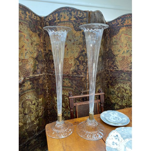 6140 - A pair of late Victorian clear fluted glass vases, 80cms tall, bases 24cm diameter  (C)