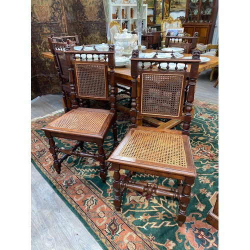 6170 - A set of six Victorian French oak Bergère dining chairs with decorative brass handles and carved lio... 