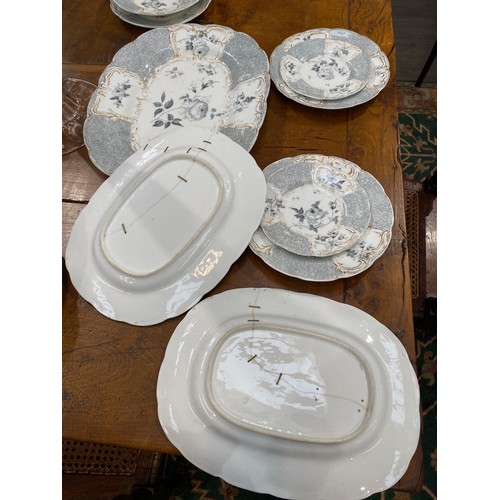 6172 - 19th century Rockingham part dinner service, tureen, sauce tureens, plates, bowls. Two of the meat p... 