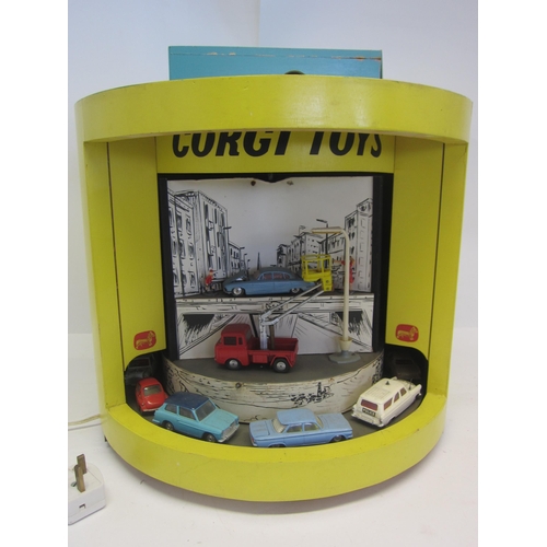 8128 - Corgi Toys - An unusual and possibly unique retail or trade fair animated display, featuring sixteen... 