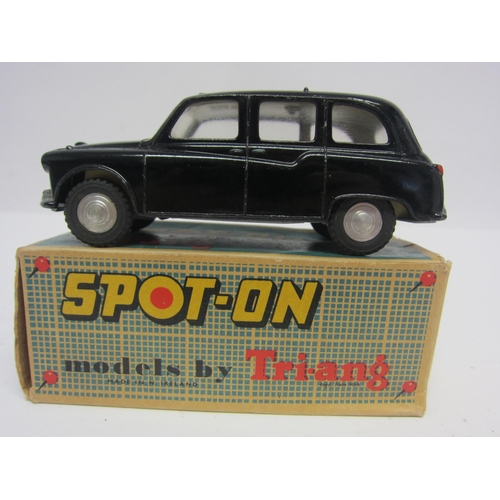 8103 - A Triang Spot-On 155 diecast model Austin Taxi in black, cream interior with red plastic steering wh... 