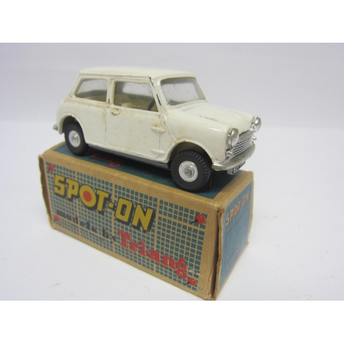 8107 - A Triang Spot-On 211 diecast model Austin Seven in cream with cream interior and black plastic steer... 