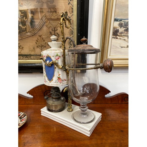 6213 - An early 19th Century French porcelain siphon coffee maker, hand painted porcelain enriched with gil... 