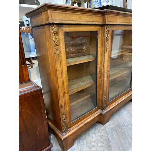 6237 - A 19th Century walnut breakfront bookcase, marquetry inlay, ornate ormolu mounts, on bracket feet, s... 