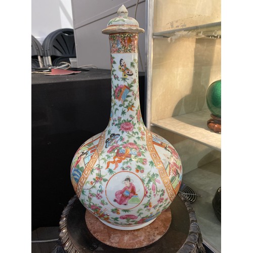 6330 - A late 19th / early 20th Century Chinese Famille Rose pattern bottle vase, restored a/f, 38cm high