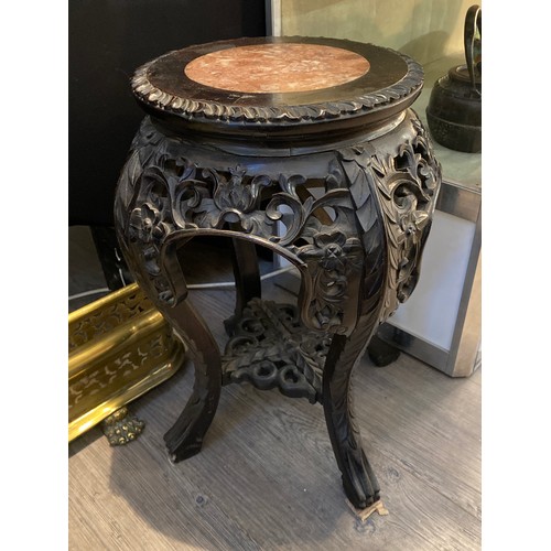 6331 - A 19th Century Chinese carved marble topped occasional table, 48cm tall, the top has a diameter of 2... 