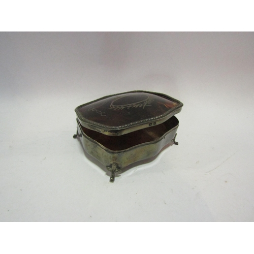 1267 - A silver footed box with tortoiseshell lid