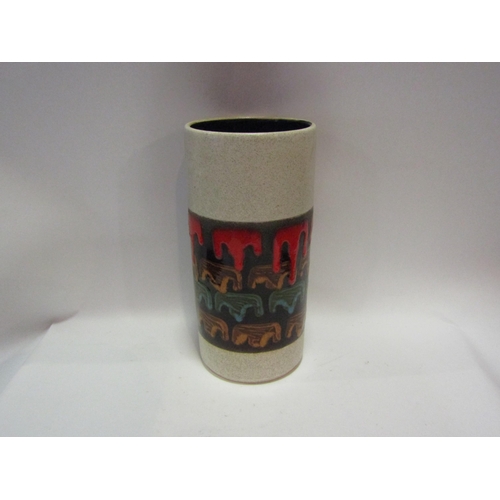 1468 - A 1960's studio pottery cylindrical vase with drip design, 30cm tall