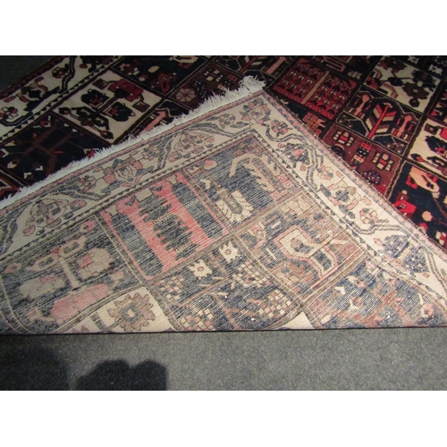 1489 - A Persian Hamedan wool on cotton rug with panelled design, tasselled ends, 250cm x 160cm