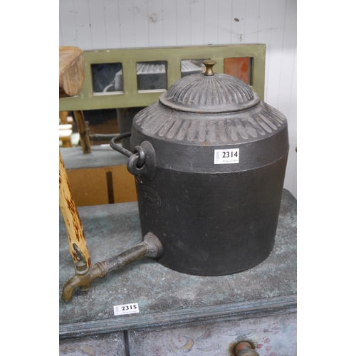 2314 - A cast kettle with long spout and hanging handle, stamped Holcroft & Sons 3 Gallons     (R) £20