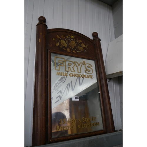 2328 - A painted metal advertising mirror, the glass painted Fry's Milk Chocolate