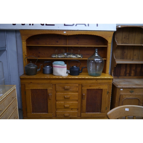 2330 - A pine kitchen dresser 69