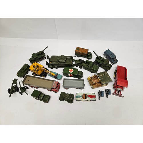 8383 - A mixed lot of playworn Dinky diecast vehicles including military examples