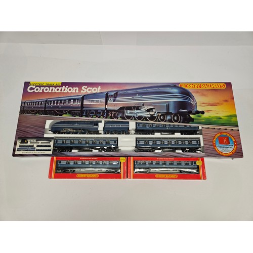 8519 - A boxed Hornby 00 Gauge R836 Coronation Scot electric train set comprising R685 LMS Coronation Class... 