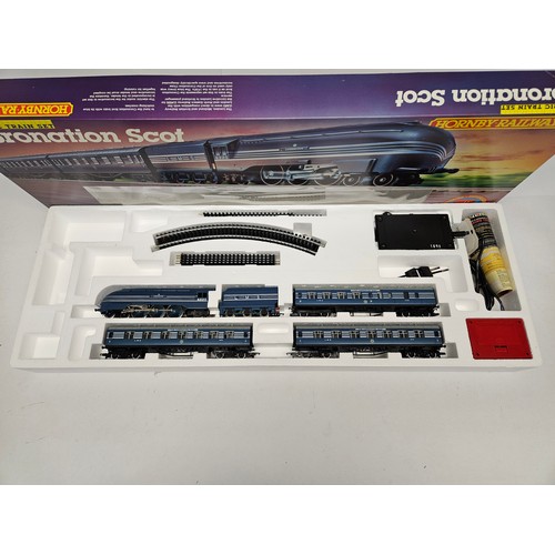 8519 - A boxed Hornby 00 Gauge R836 Coronation Scot electric train set comprising R685 LMS Coronation Class... 