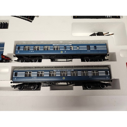 8519 - A boxed Hornby 00 Gauge R836 Coronation Scot electric train set comprising R685 LMS Coronation Class... 