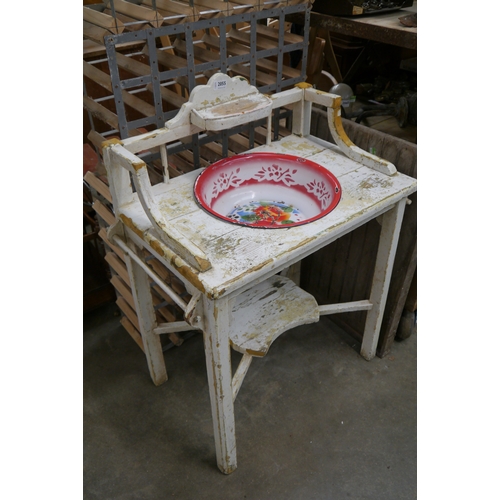 2055 - A painted washstand with enamel bowl