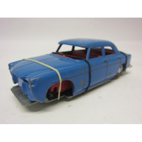 8123 - Four playworn Triang Spot-On diecast vehicles to include 216 Volvo 122.S with Sliding Roof in light ... 