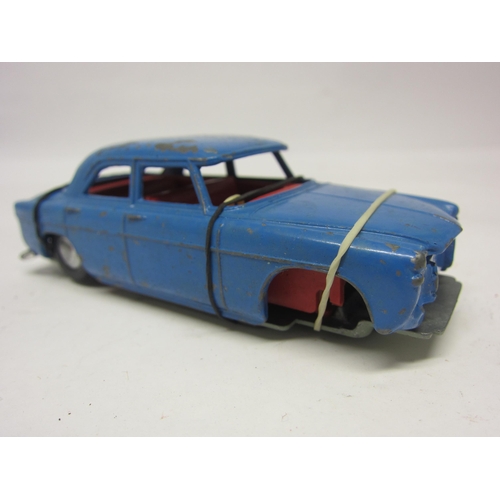 8123 - Four playworn Triang Spot-On diecast vehicles to include 216 Volvo 122.S with Sliding Roof in light ... 