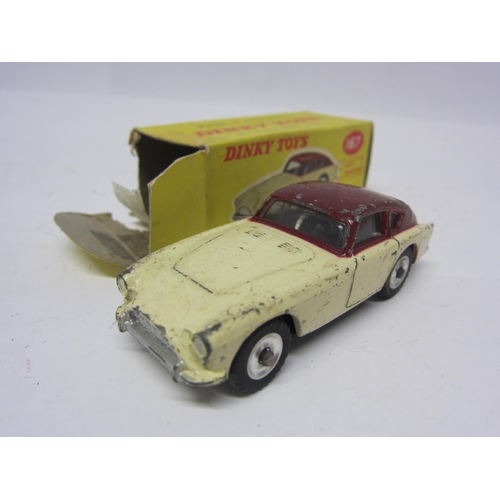 8206 - Four Dinky Toys playworn diecast cars to include 181 Volkswagen Beetle, 167 A.C. Aceca, 198 Rolls-Ro... 