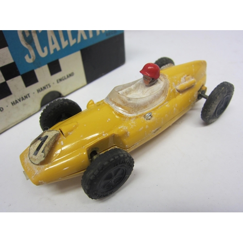 8394 - Four boxed Triang Scalextric slot racing cars to include C54 Lotus in yellow, C62 Ferrari in red, C6... 