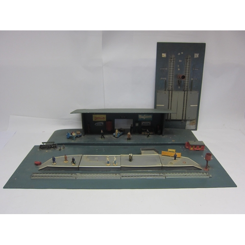 8467 - A home made 00 gauge model railway wooden station layout in three sections, featuring assorted lead,... 