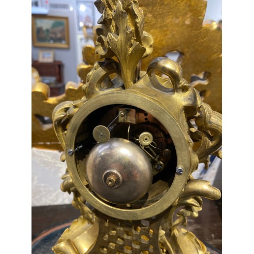 6060 - A mid 19th Century French Raingo Freres ormolu and gilt brass mantel clock, relief moulded Rococo fo... 