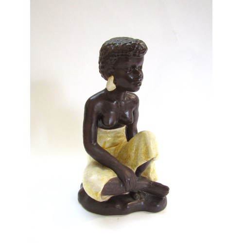 9124 - A Danish Solholm Pottery figure of a young woman, marks to base and Numbered 826. 31cm high