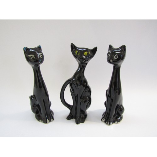 9087 - Three black glazed ceramic cats, two in style of Schmider 1950's, tallest 22.5cm