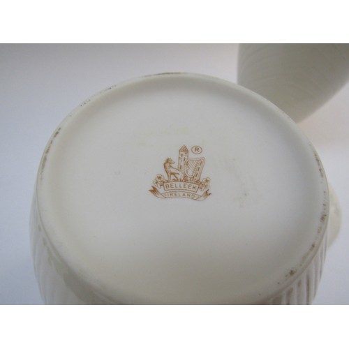 9061 - A pair of Belleek porcelain lidded canisters, c1980's mark, 23cm high