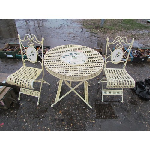 3531 - A folding metal garden table with two chairs