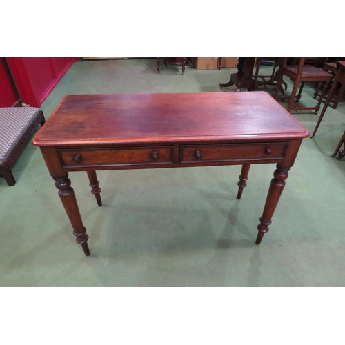 4001 - A Victorian mahogany side table with two drawers, turned tapering legs to peg feet, 71cm high x 104c... 
