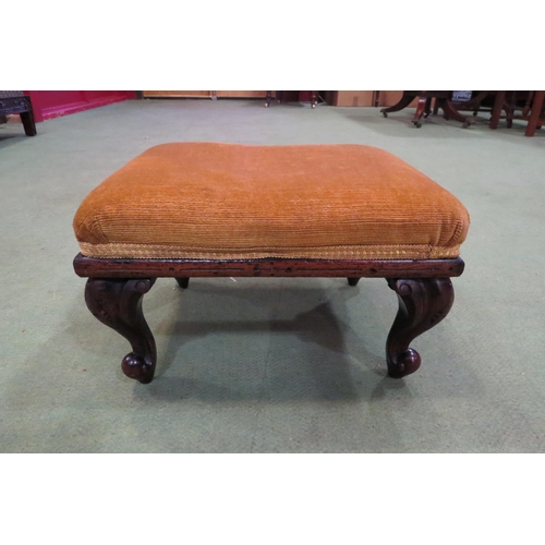 4007 - A 19th Century mahogany footstool on carved cabriole scroll feet, 20cm tall x 32cm wide x 26cm deep